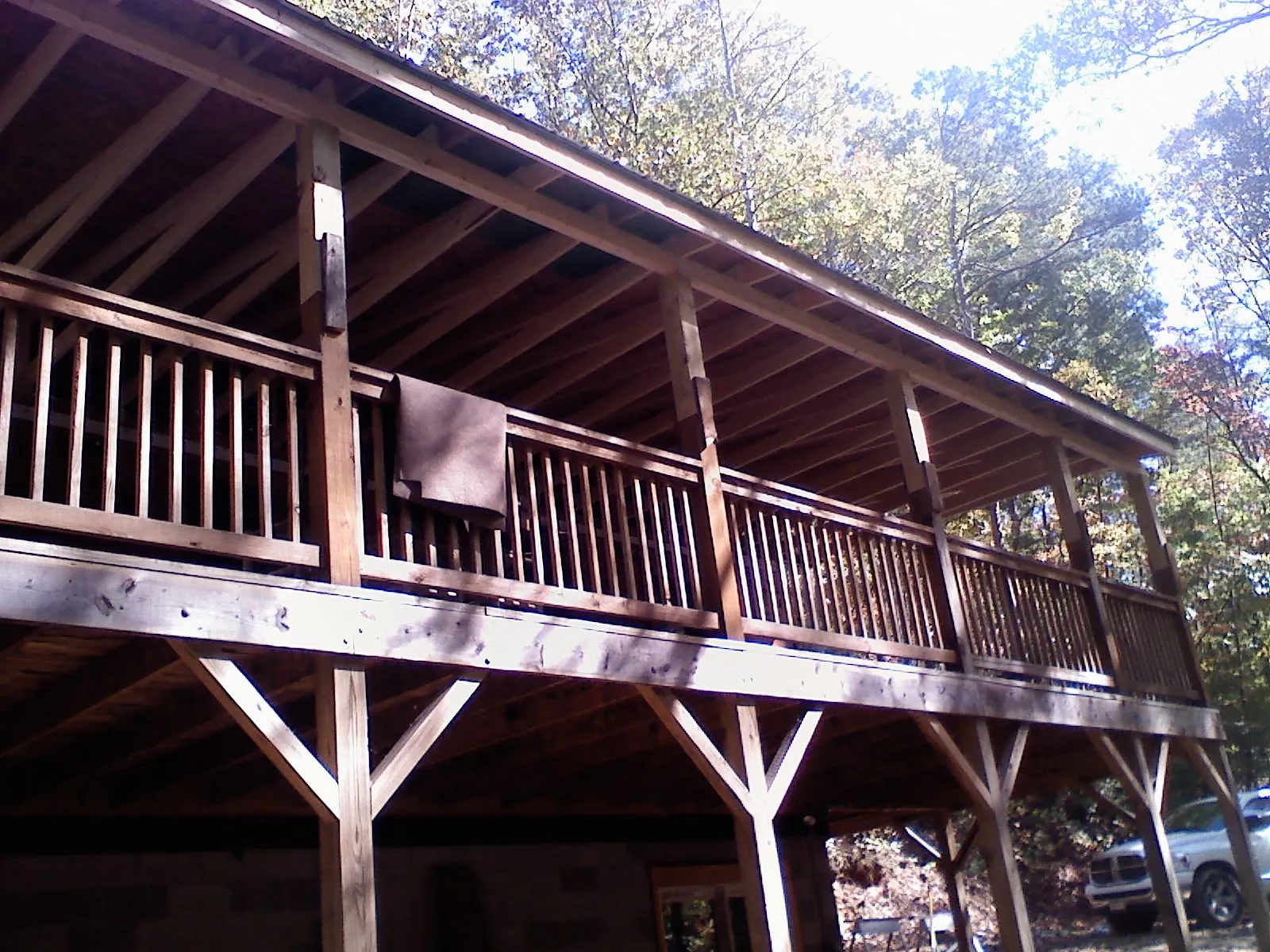 Timber framing under a new elevated porch and deck — Roof Leak Repair in Mansfield by Roofing Brothers